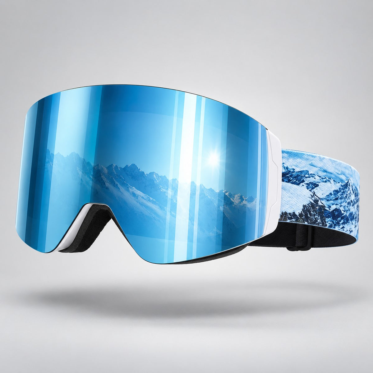 Snow Goons magnetic ski goggles, blue mirror lens, studio shot